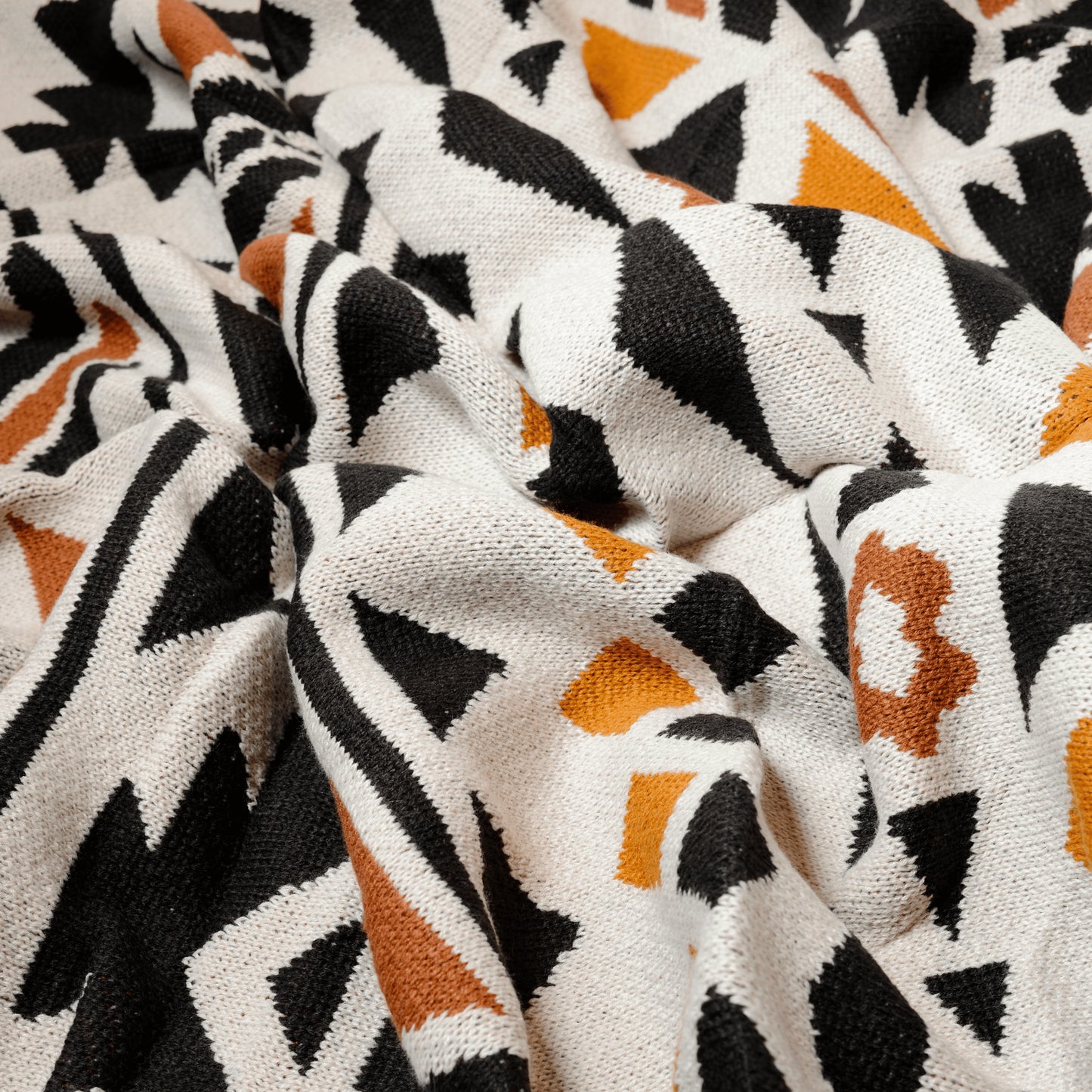 Plaid bohème à motif posé et froissé en gros plan sur les motifs